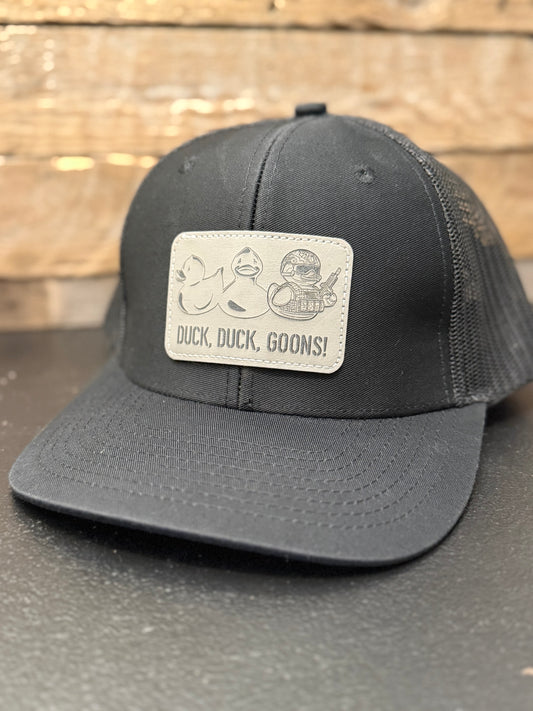 “Duck, Duck, Goons!” Trucker Hat (Black/Light Leather) – Tactical Swagger