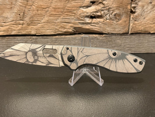 Beautiful Custom Engraved Daisy Burst Buck Knife – Blade of Rebellion