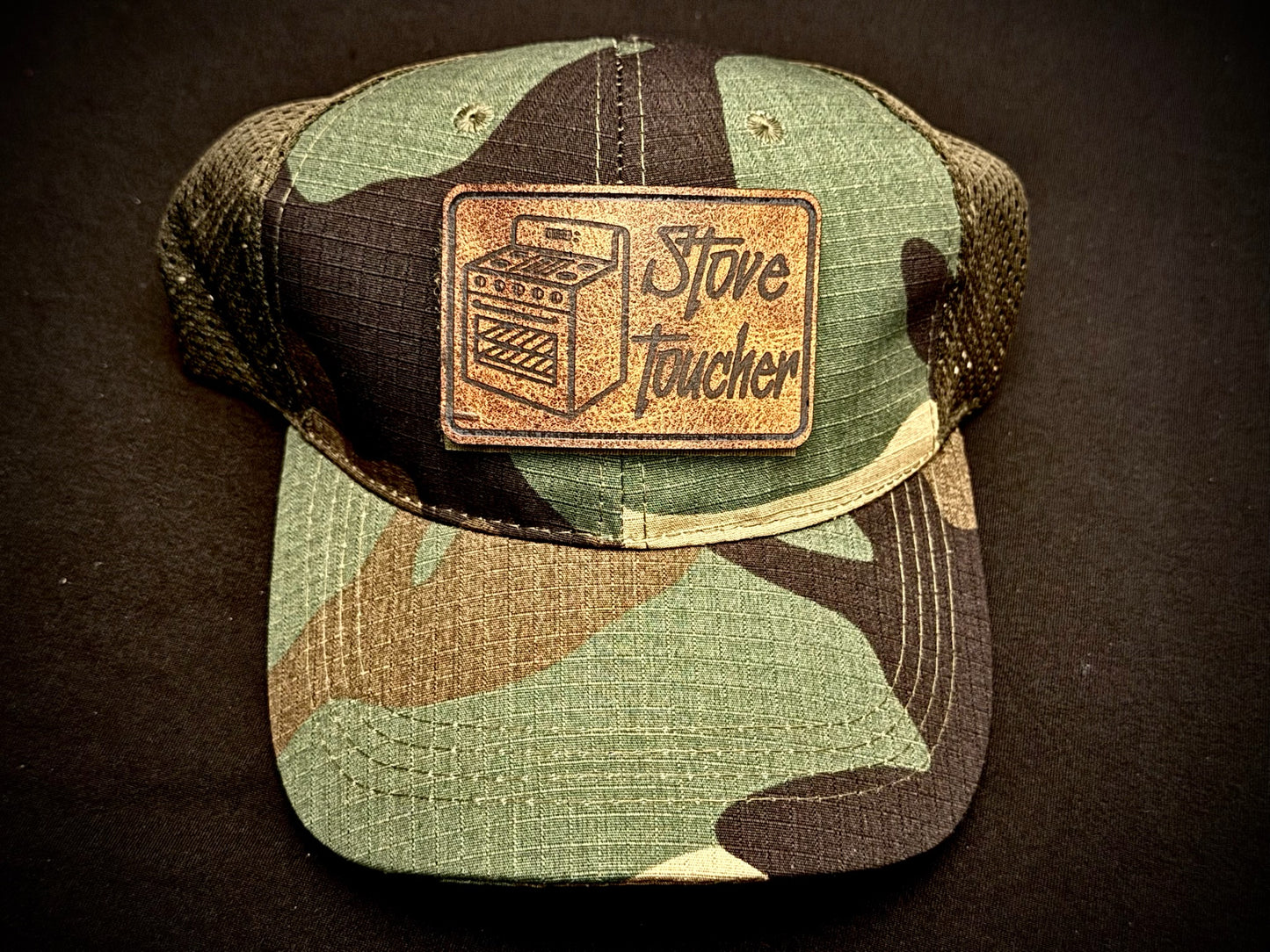 Bad Days Tactical Mesh Hat in Woodland Camo with funny leatherette morale patch that says "Stove Toucher" 